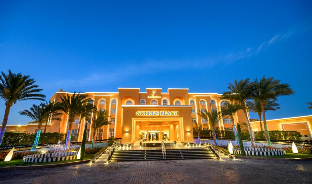 Illuminated entrance of Golden Beach Resort